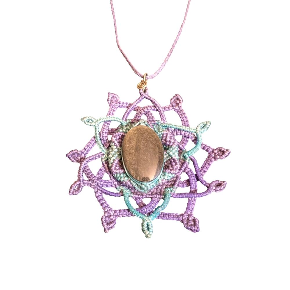 Handmade mandala necklace with a large stone.